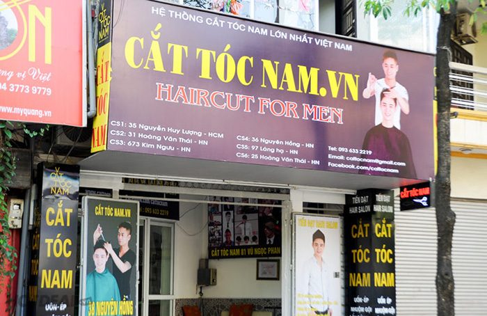 bảng hiệu tiệm cắt tóc
